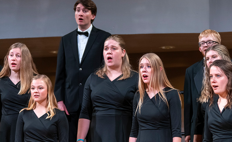 Members of A cappella Choir performing at music department showcase