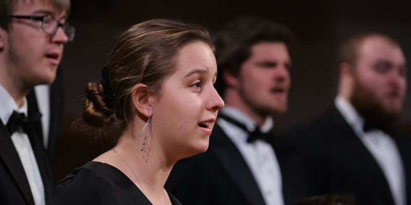 A cappella Choir members singing