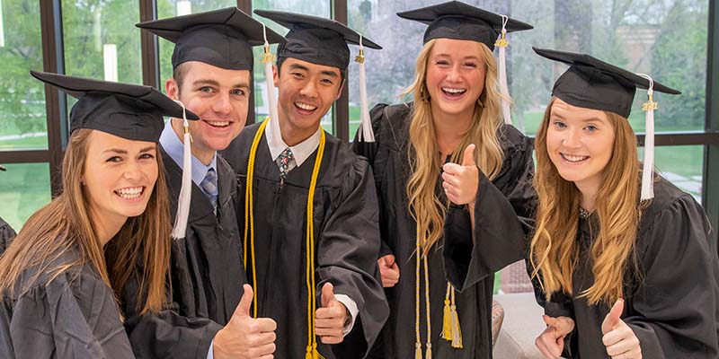 Class of 2021 graduates pictured in caps and gowns