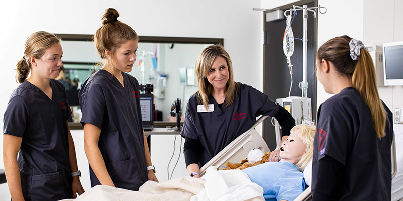 Nursing students and professor