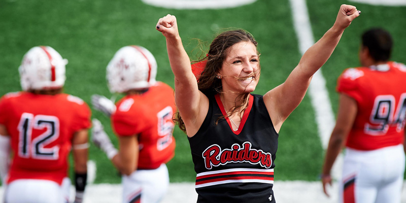 Northwestern cheerleader at football game