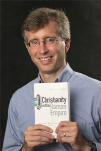 Dr. Robert Winn with book