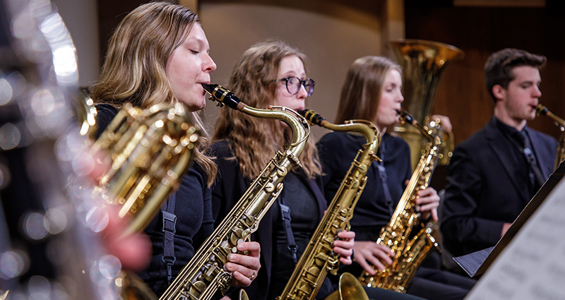 Students playing saxophones