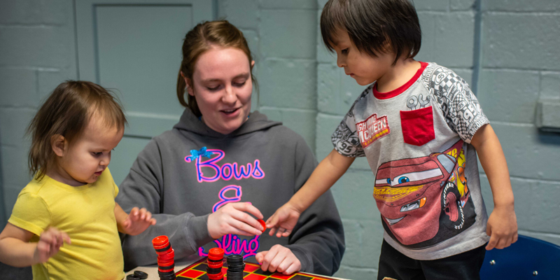 Allison Wheeler interacting with children