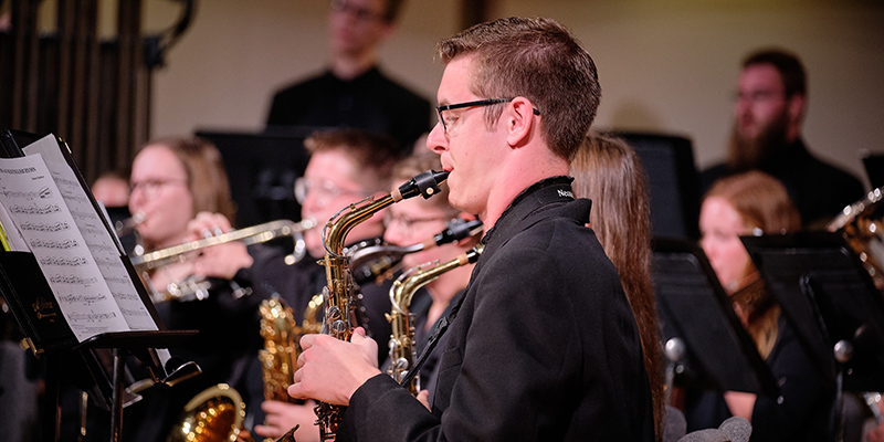 Student playing a saxophone