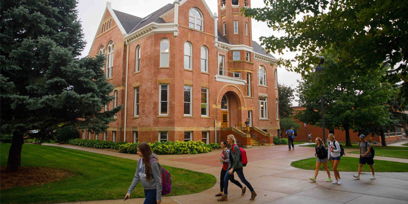 Students walking by Zwemer Hall