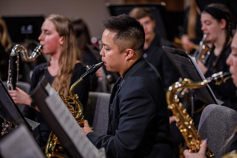 Symphonic band performing during concert