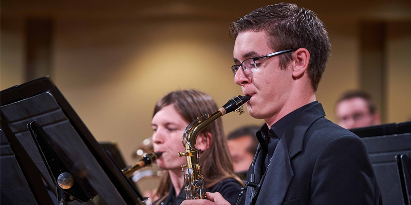 Student playing a saxophone