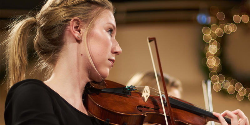 Northwestern student playing the violin