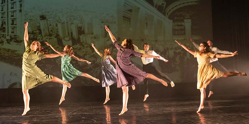 Dancers performing on stage in RUSH