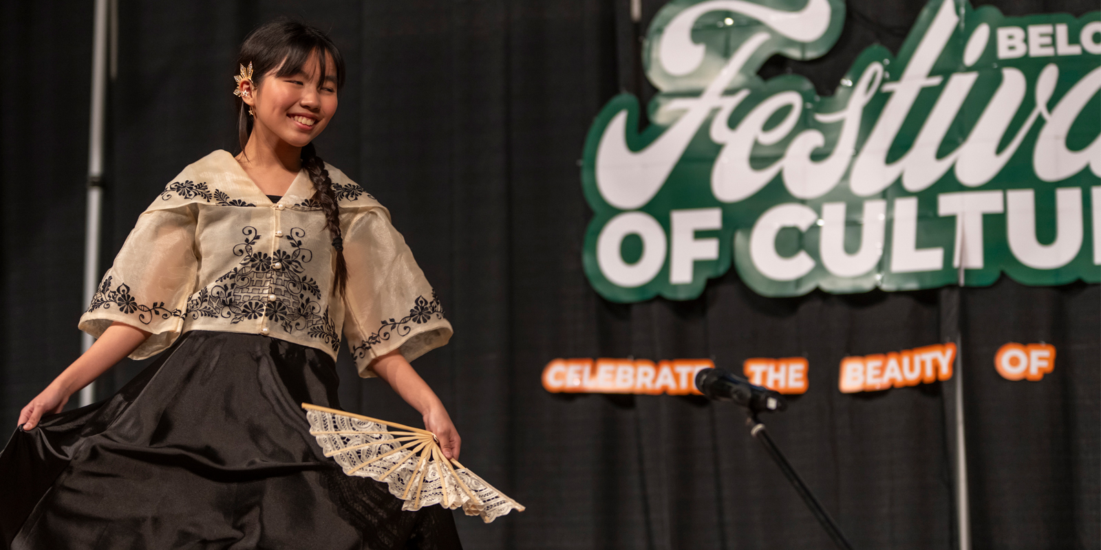 A Filipina student dances at the 2024 Beloved Festival of Culture