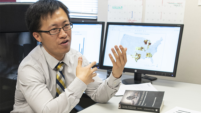 Dr. Fan Fei, associate professor of business and economics