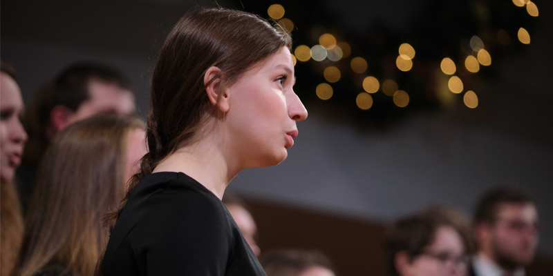 Student singing in Vespers concert